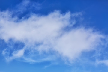 Naklejka na ściany i meble Blue sky with clouds close up image as a background