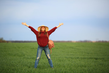Fototapeta premium Inspired woman in the field, nature,green field, space, healthy lifestyle