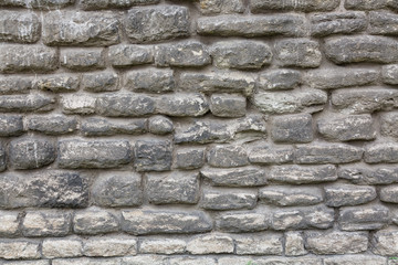 Old grey brick wall texture background. Abstract texture for designers