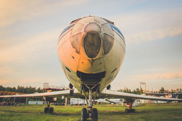 An old, abandoned plane. Chassis. Propeller. Wing