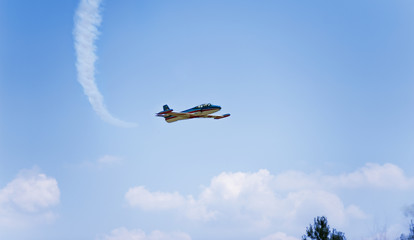 Acrobatic plane flying low