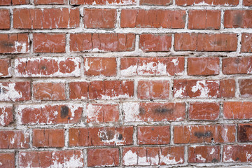 Brick wall, old texture of red stone blocks. Background.