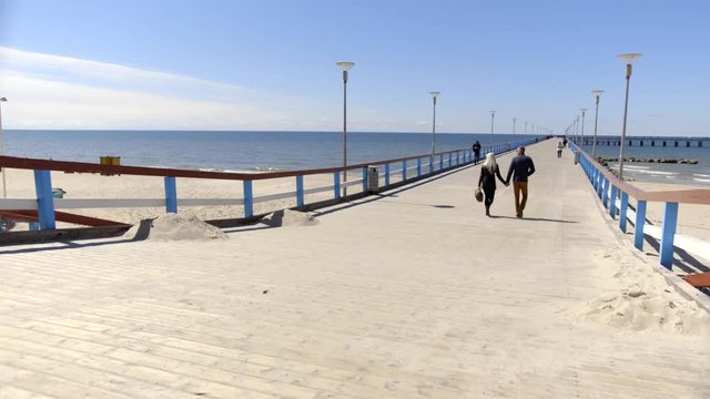 Wooden pier. Sandy coast of the Baltic Sea. Palanga. Lithuania