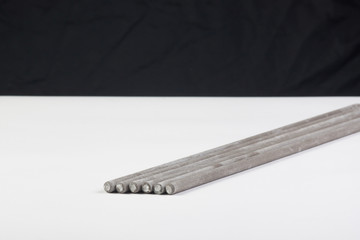 Electrodes on a white table on a black background