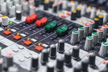 Audio control panel in the conference room in soft light.