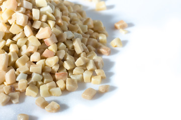 beautiful natural yellow stone scattered on a white background