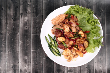 Spicy fried jackfruit seeds and chicken with roasted chile paste.