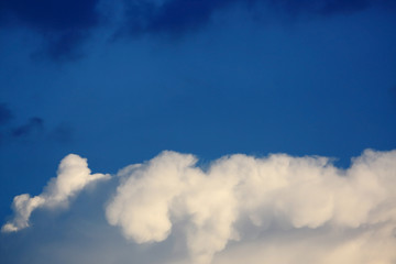 Obraz premium white cloud above blue sky