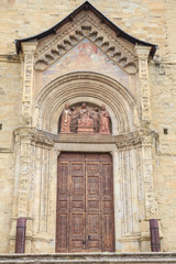 Fototapeta na wymiar Arezzo in Tuscany, Italy -Side entrance to Saint Donatus Cathedral