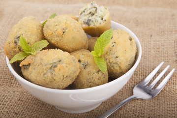 a handful of homemade croquettes of spinach