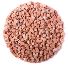 beautiful natural pink stone scattered on a white background