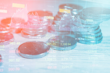 Stack coin money finance and banking with profit graph of stock market trade indicator financial.Double exposure style