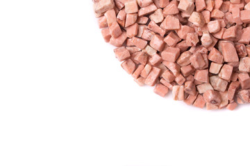 beautiful natural pink stone scattered on a white background