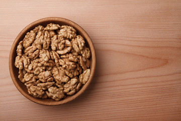 Walnuts in wooden bowl