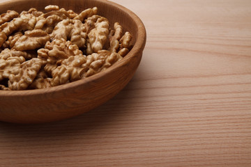 Walnuts in wooden bowl