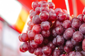 Bunch of raw grape display at fresh market