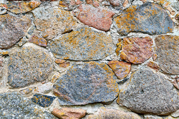 Old stone wall rustic texture background. 