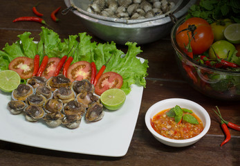 Fresh Cockles in the dish and Vegetables, ingredient prepare for seafood sauce Scald cockles / Selective focus ..
