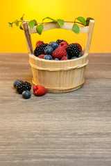 Wooden basket with berries