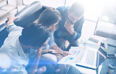 Business meeting concept.Coworkers team working new startup project at modern office.Analyze...
