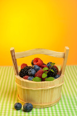 Wooden basket with berries