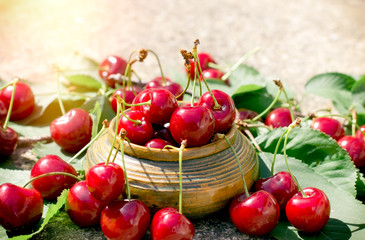 Refreshing and juicy fruit - organic cherry in rustic bowl