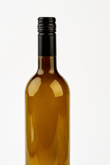 Vertical image of brown bottle. Empty glass bottle, white background.