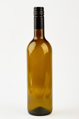 Empty dark glass wine bottle. Brown glass bottle, white background.
