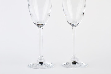 Two wine glasses, cutted image. Couple goblets on white background.