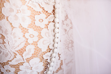 part of the wedding dress on the bride
