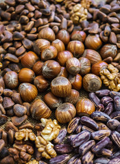 Different nuts scattered on the table.
