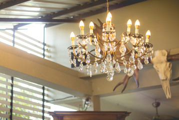 Home interiors Chandelier on ceiling. Vintage luxury chandelier for home decoration