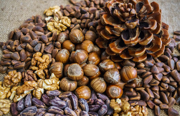 Different nuts scattered on the table.