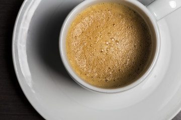 Espresso coffee close up on a white dish