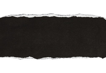 black torn paper isolated on white background.