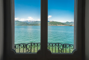 Fototapeta na wymiar retro window landscape lake view from inside indoor