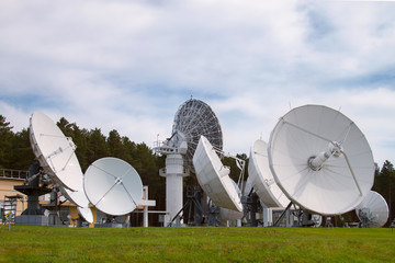 Satellite dishes are aimed at the sky