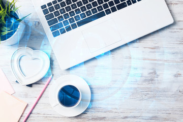 Business workplace with laptop coffee cup and security concept on screen