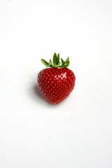 Red strawberry isolated on white background.