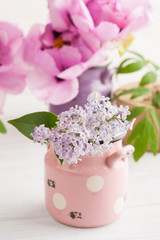 Kraft gift box, peonies and lilac flowers