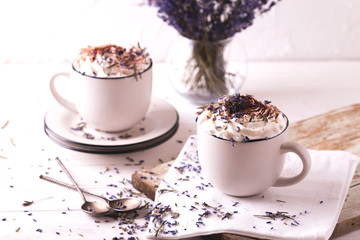 Two cups of hot chocolate with whipped cream