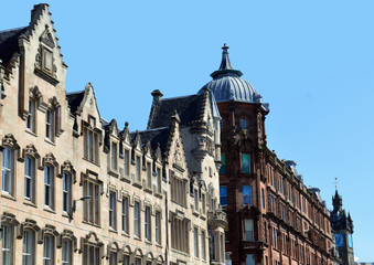 Fototapeta premium Victorian architecture, Trongate, Glasgow, Scotland with the older Tolbooth Steeple behind