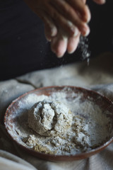Women's hands are preparing home-made raw noodles, Rustic, Selective Focus, Atmospheric dark tone
