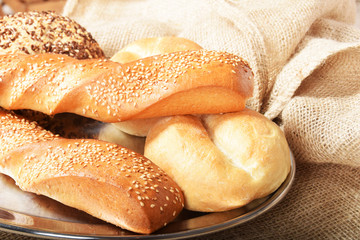 Baked fresh bread rolls for breakfast with grains