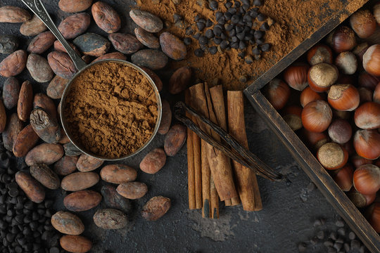 Cocoa And Nut Mix On A Dark Background, Randomly Scattered, Selective Focus, Top View