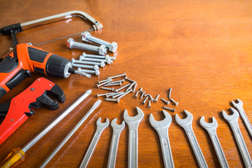 Obraz na płótnie Canvas Set of tools supplies on wood background