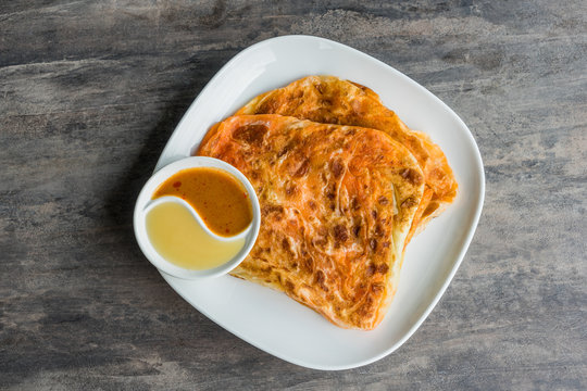 Indian Roti Prata with Condensed milk and Curry Sauce