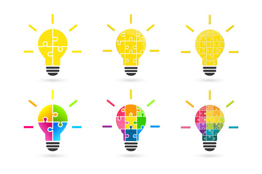 Light bulb made of puzzle pieces as idea concept. Set made of various color and complexity.