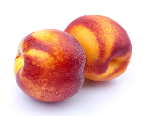 Peach isolated. Whole nectarine fruits isolated on white background with clipping path