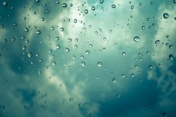 rain drop on window street background